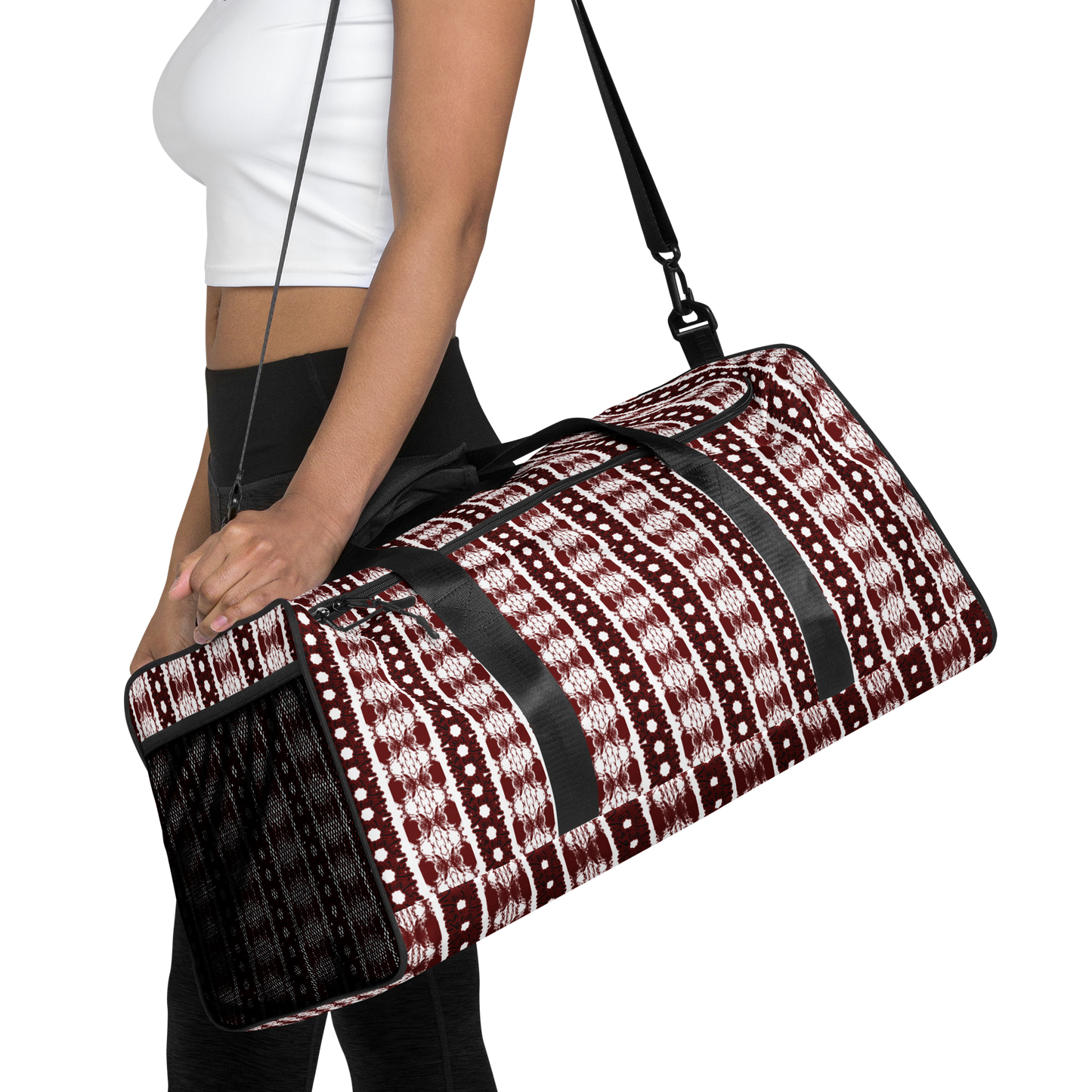 Our duffle bag is built to last. Its robust construction, featuring 100% polyester with black interlining, ensures it can handle the demands of your busiest days. With a generous interior space measuring 22" x 11.5" x 11.5", staying organized has never been easier. Utilize the multiple pockets, including a secure zipper pocket, to keep your essentials within reach. our duffle bag ensures stability with T-piping, providing peace of mind as you navigate daily.