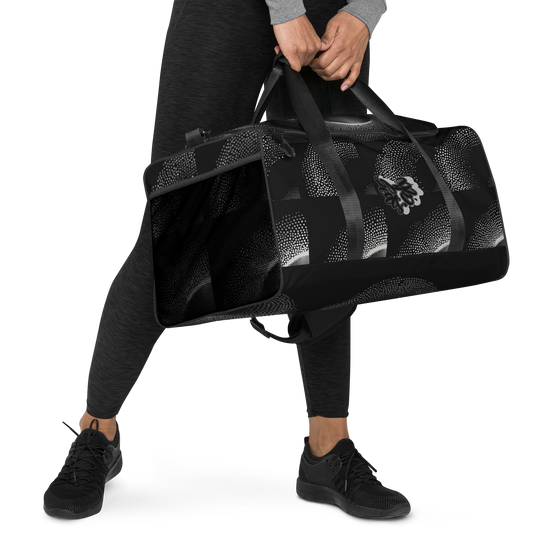 A fusion of durability, style, and practicality. The elegance of its art, makes it a statement piece beyond just a duffle bag. Crafted with meticulous attention to detail, ample interior space, adjustable padded straps and dual handles checks comfortability and convenience. Stability is guaranteed with T-piping. Elevate your travels with our Artisan Duffle Bag.